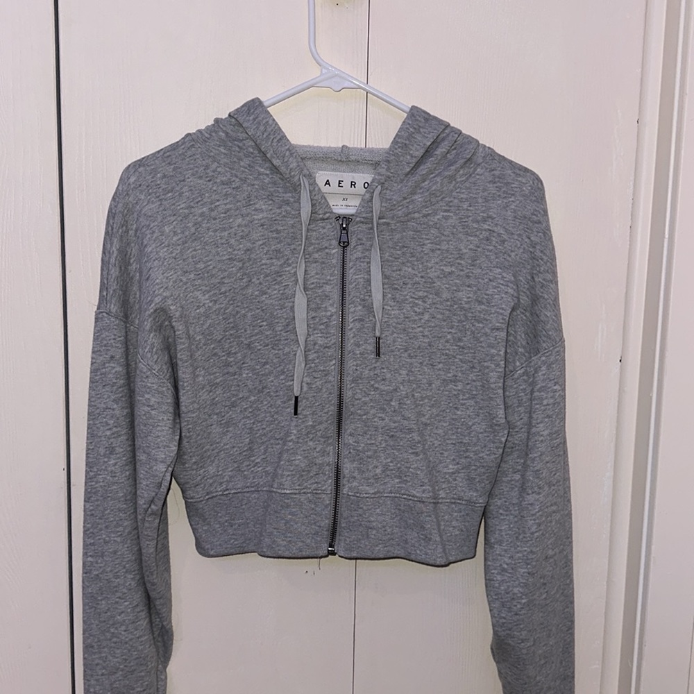 Cropped light grey zip up jacket. Super soft, lightweight. Size xs.